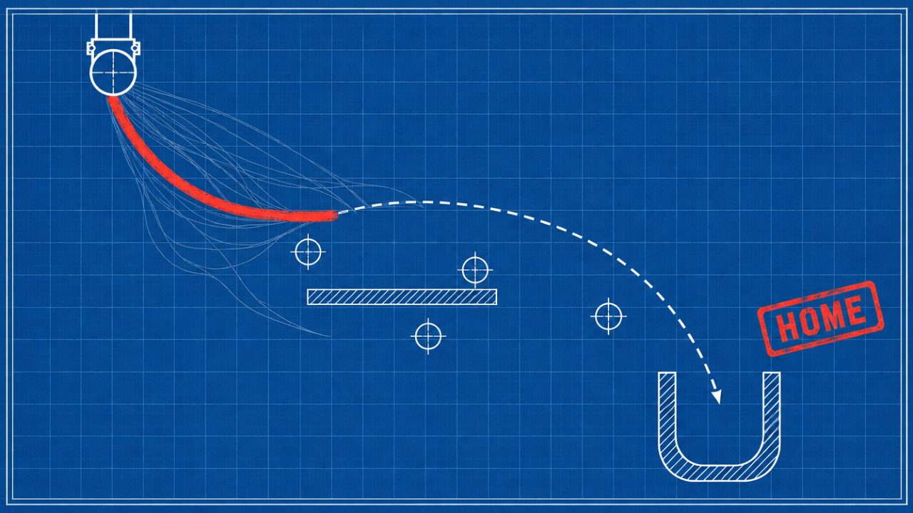A blueprint sheet: a steel marble in a clamp, one red pencil line below it, and the marble's path into a hatched cup.